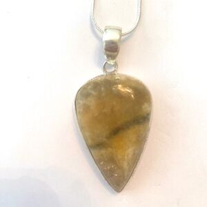 Beautiful, 2 inch, Bumble Bee Jasper gemstone pendant on a silver chain.